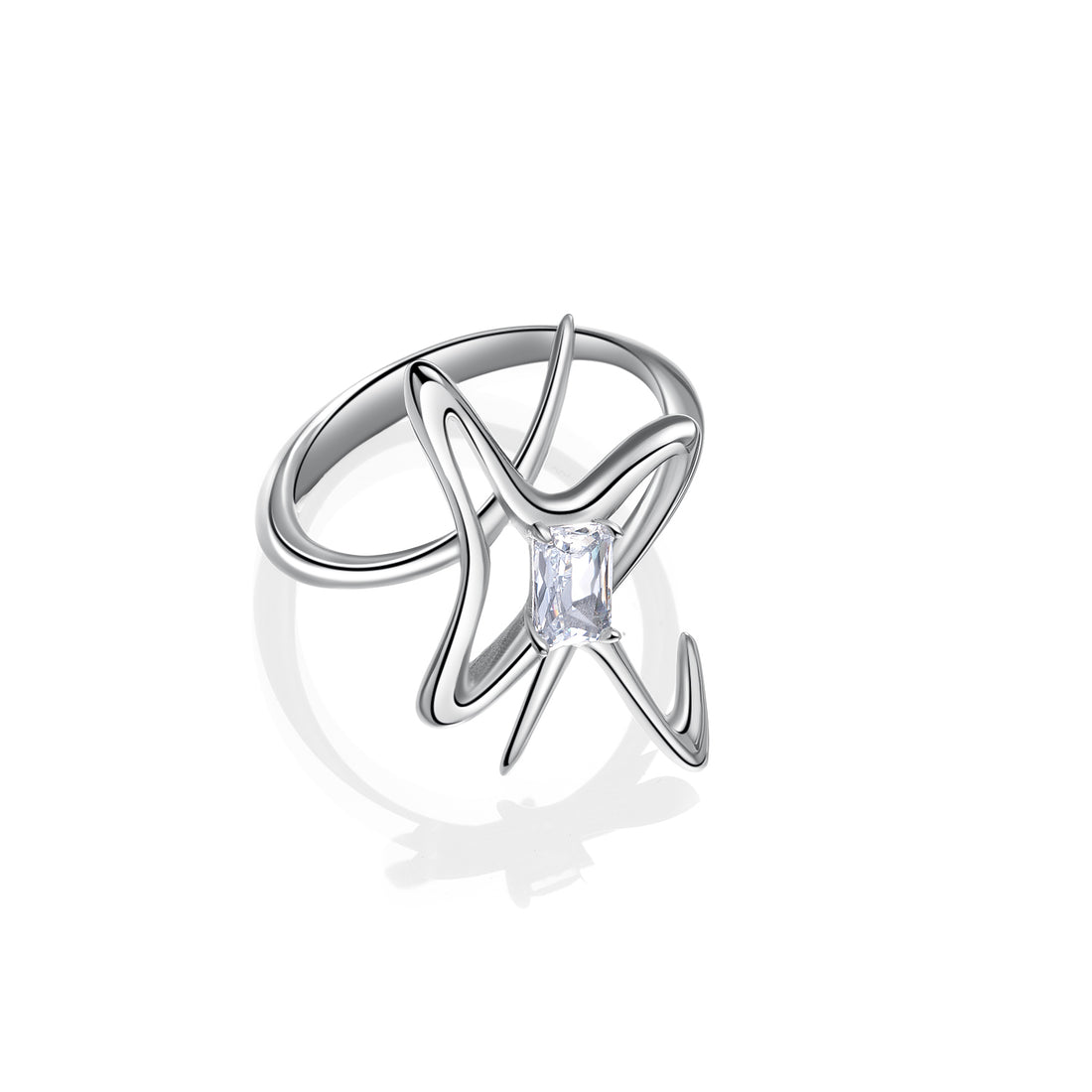 Futuristic silver star ring with an emerald-cut zircon at the center, featuring sculptural lines and a cosmic-inspired design