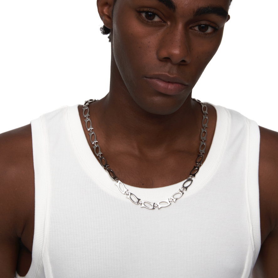Front view of a 925 sterling silver necklace with sleek cyberpunk blade segments, featuring geometric sculptural links and a futuristic techwear-inspired design.

