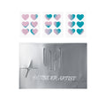 Holographic heart-shaped pimple patches in pink and teal gradient for acne care.