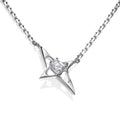 Close-up of a silver geometric star necklace with faceted center stone on a high-shine chain. Sculptural 925 sterling silver pendant with futuristic Y3K design.